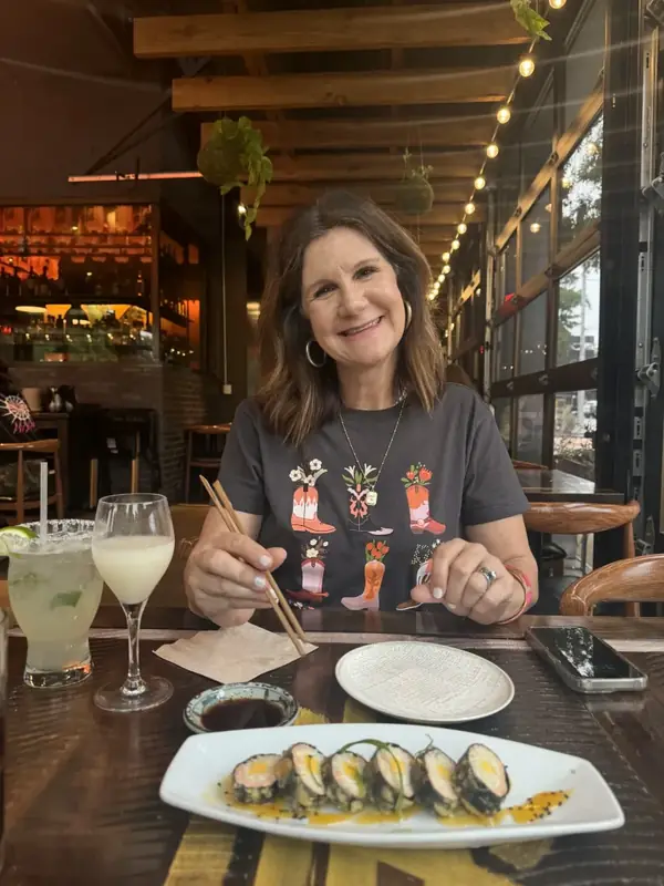 Lisa at a sushi dinner with margaritas
